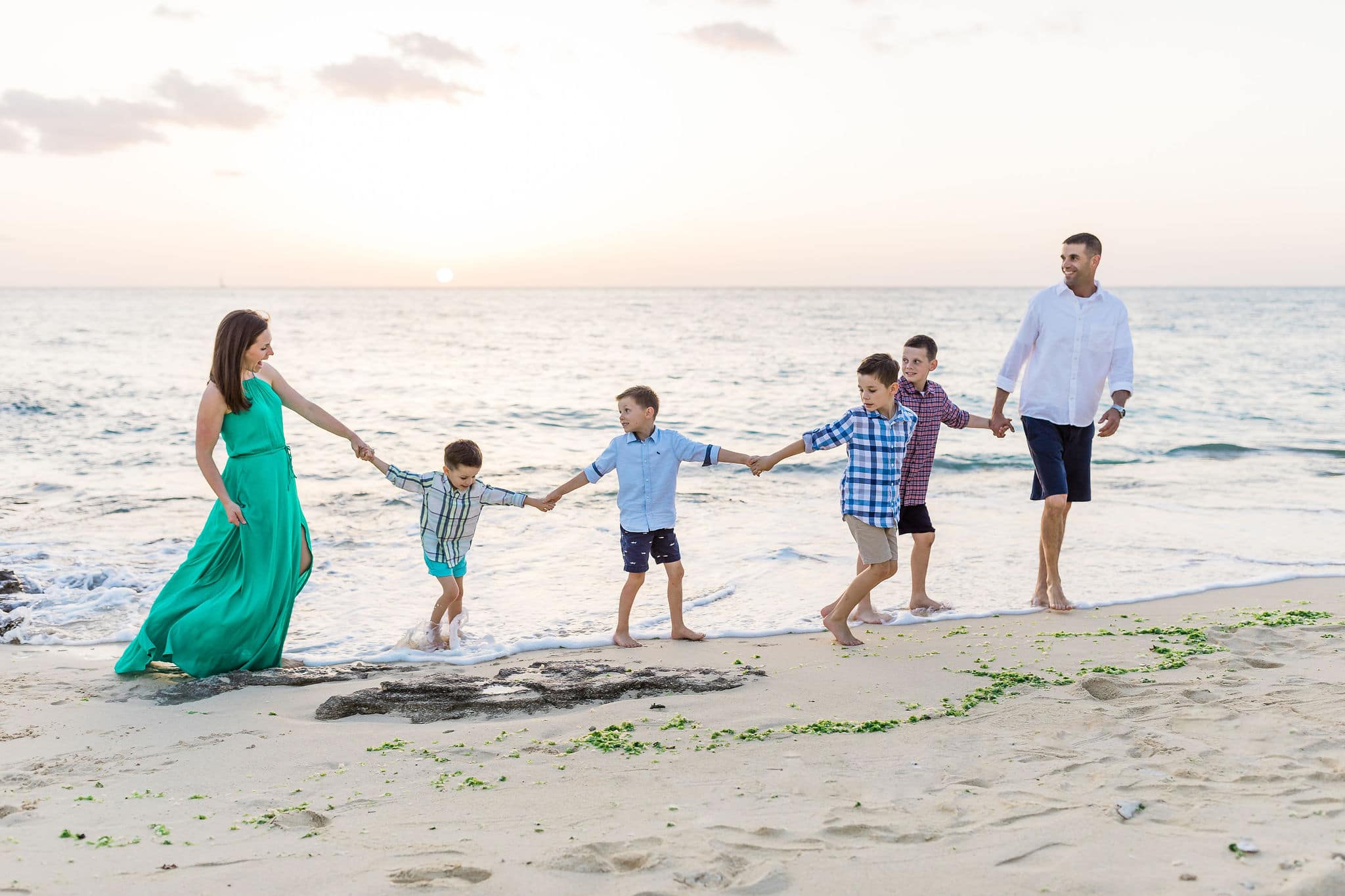Family photo session on the beach by Heather Johnson Photography