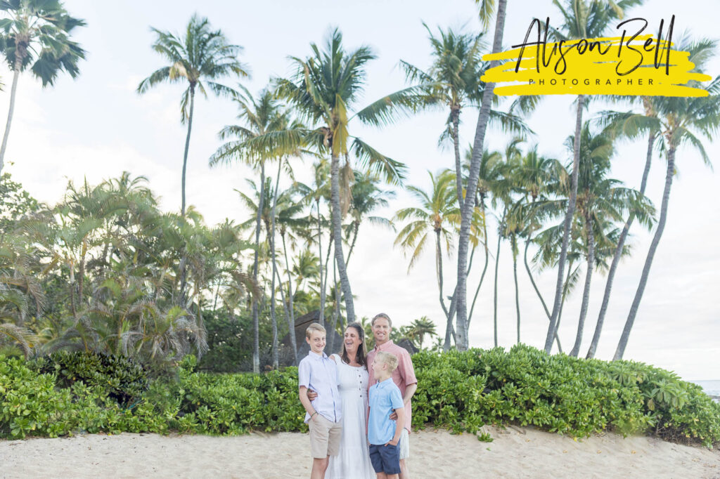 family and palm trees paradise cove beach, ko olina, oahu