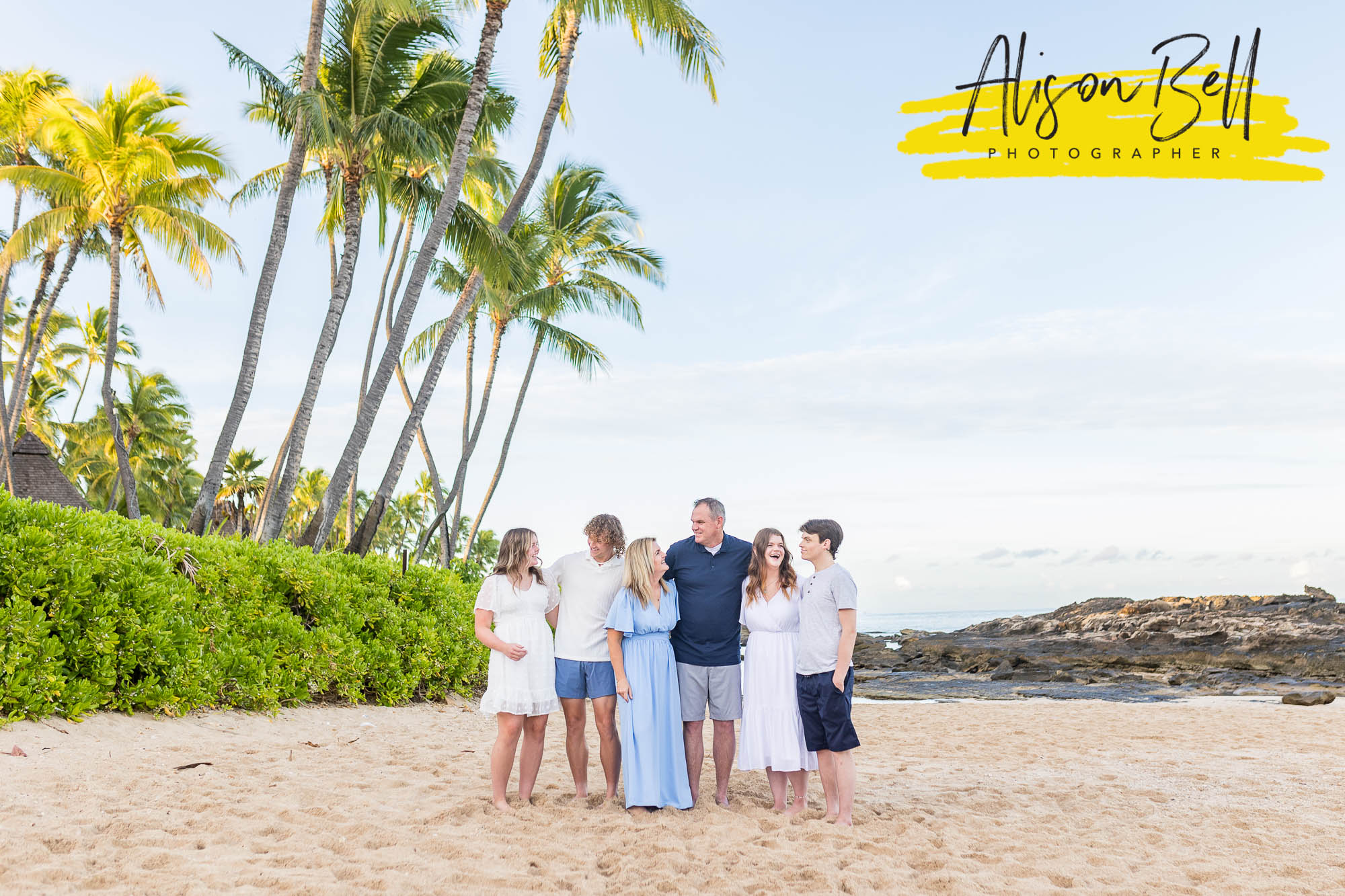 family with teens at paradise cove beach, ko olina, oahu by alison bell, photographer